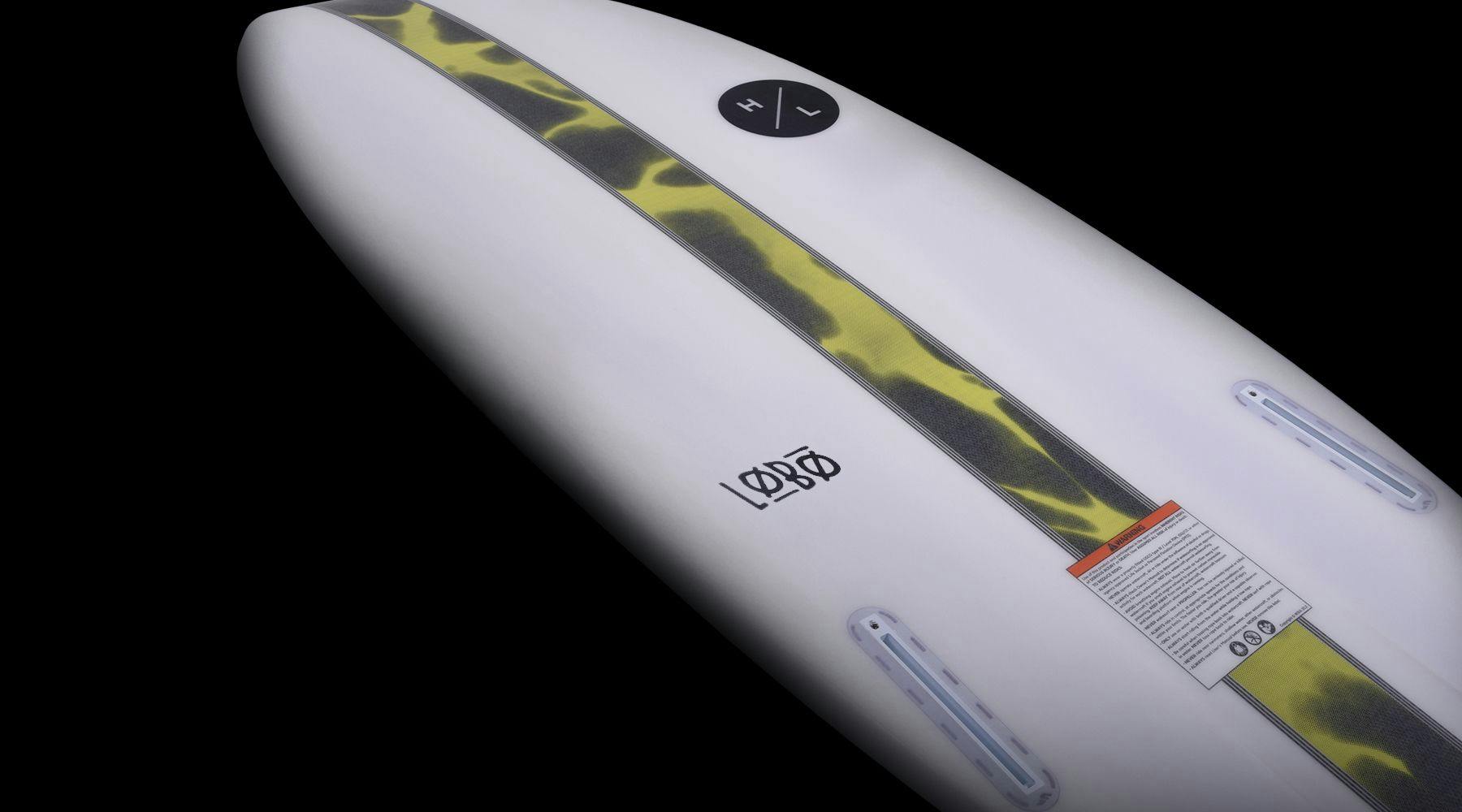 A close-up view of the bottom of the Hyperlite 2025 Lobo Wakesurf Board showcases a green and black striped design, complete with a twin fin setup, vented tail channel, and emblazoned with the Hyperlite logo.