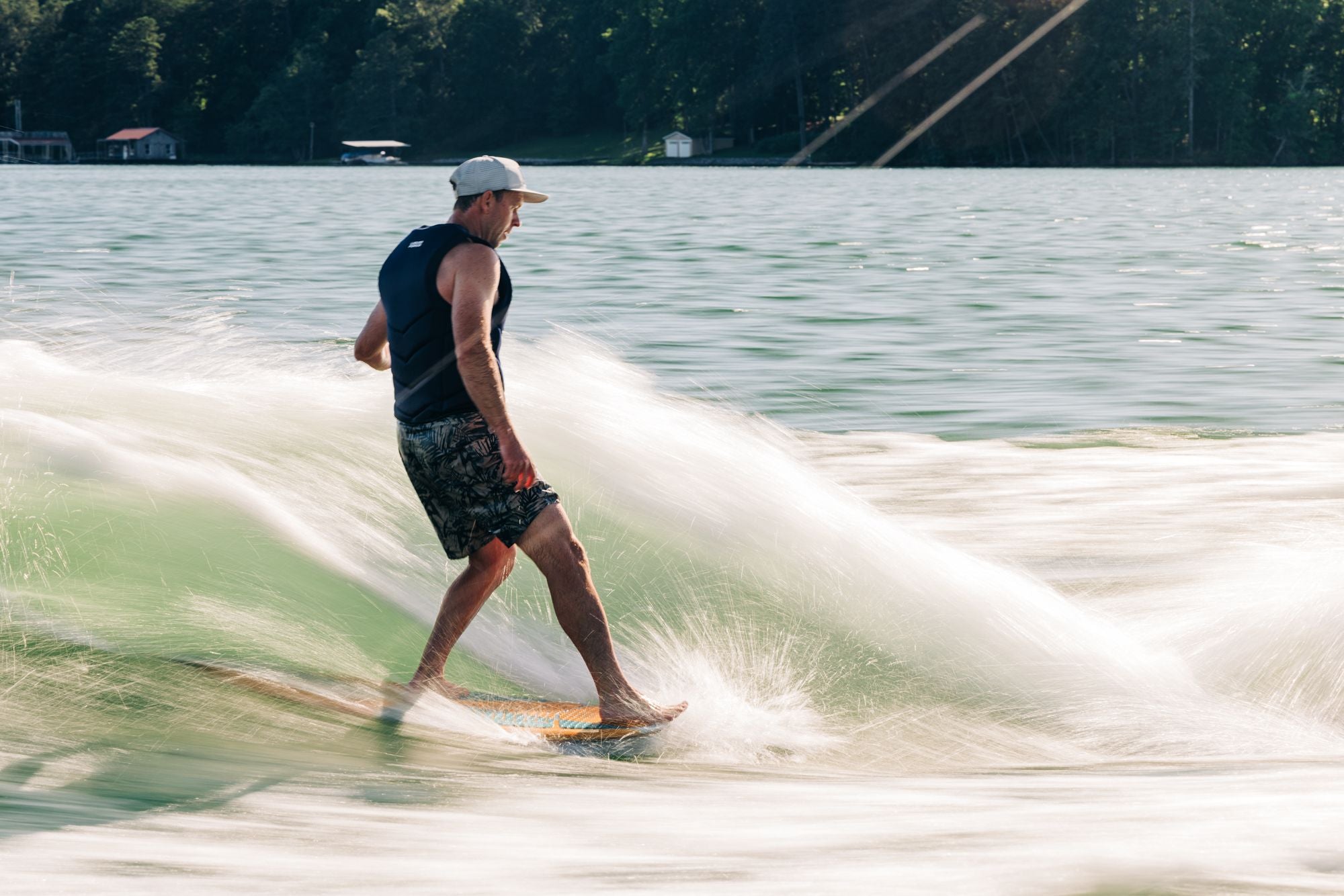 Liquid Force 2025 El Guapo Wakesurf Board Tommy C getting his toes on the nose