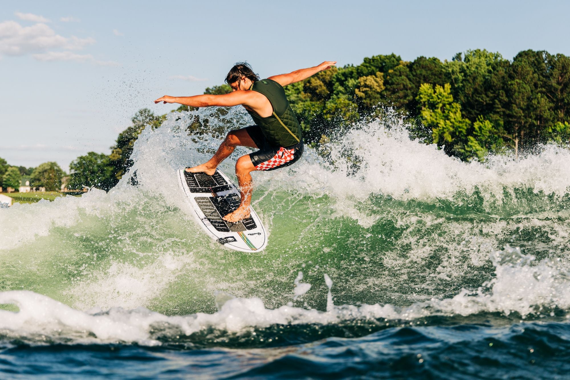 Liquid Force 2025 Quattro Wakesurf Board - Harley Clifford breaking the tail loose on top of the wave