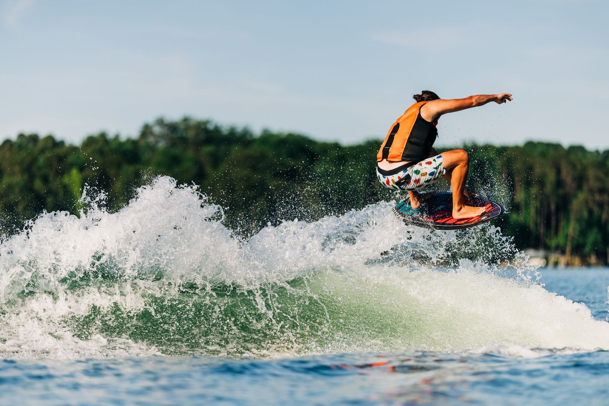 Jake Caster rides the Liquid Force 2025 Syncro Wakesurf Board