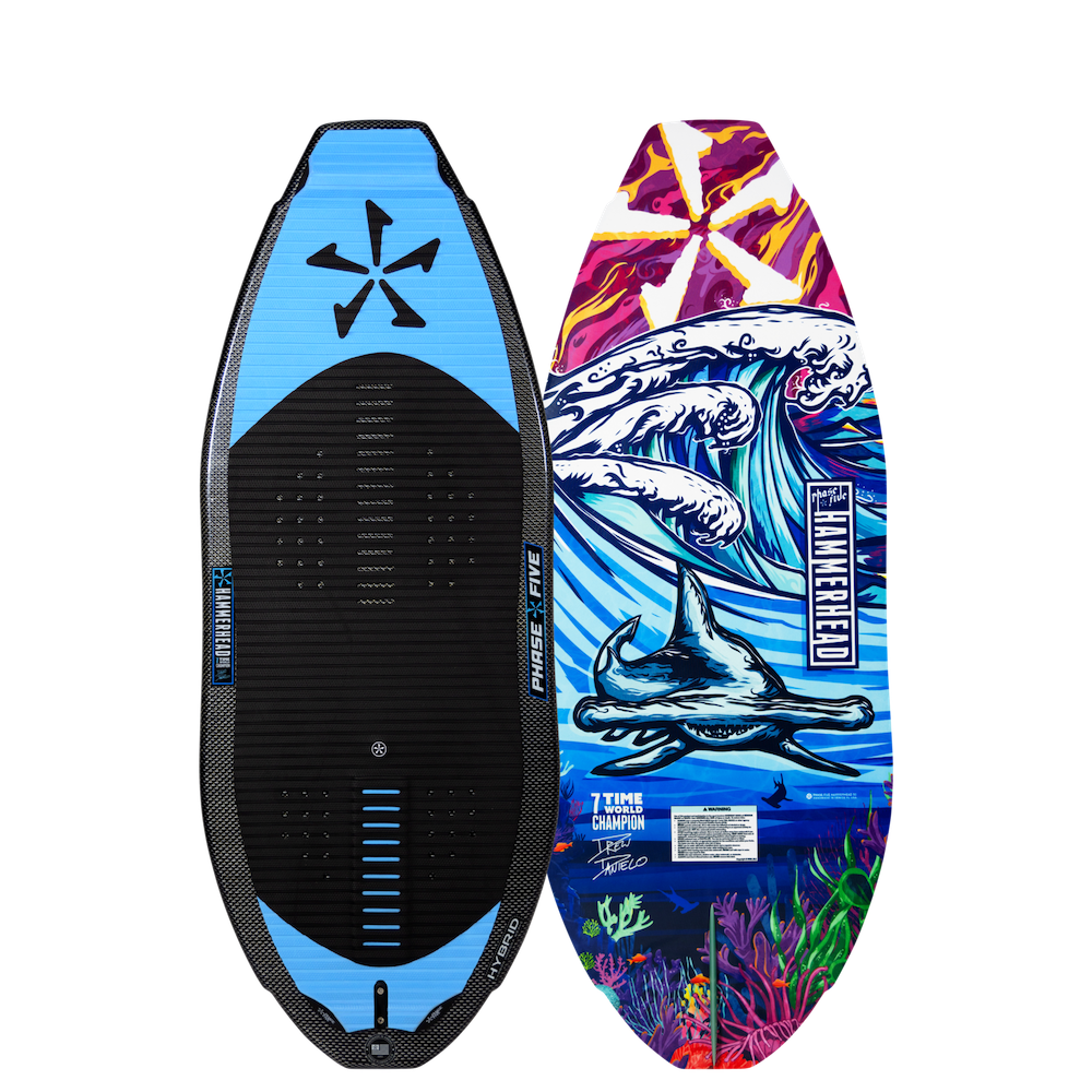 Two Phase 5 surfboards side by side: the 2025 Hammerhead v3 Wakesurf Board showcasing a blue geometric design, and another displaying a colorful ocean scene complete with waves and a manta ray. Both boards elevate your surfing experience with Hybrid Carbon™ technology for unmatched performance.