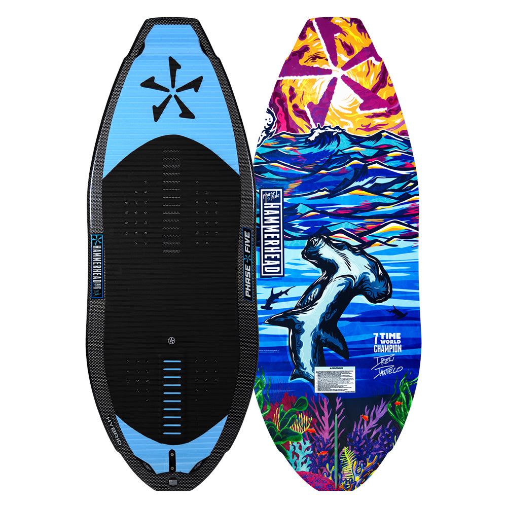 The Phase 5 2025 Hammerhead v3 Wakesurf Board, showcasing a blue pattern and colorful artwork of a shark, ocean, and coral, exemplifies the innovative design of Skim Style.