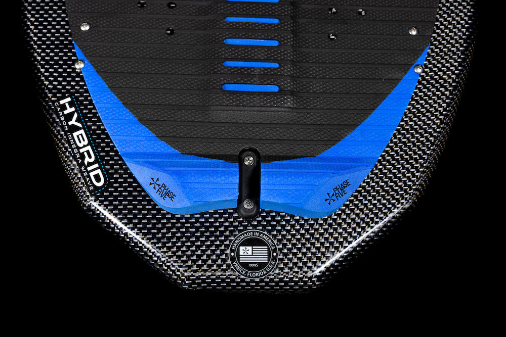 Close-up of the tail section of a Phase 5 Diamond Turbo Wakesurf Board 2026 with blue traction pads, the Phase 5 branding on the side, and a round logo featuring Florida and an American flag.