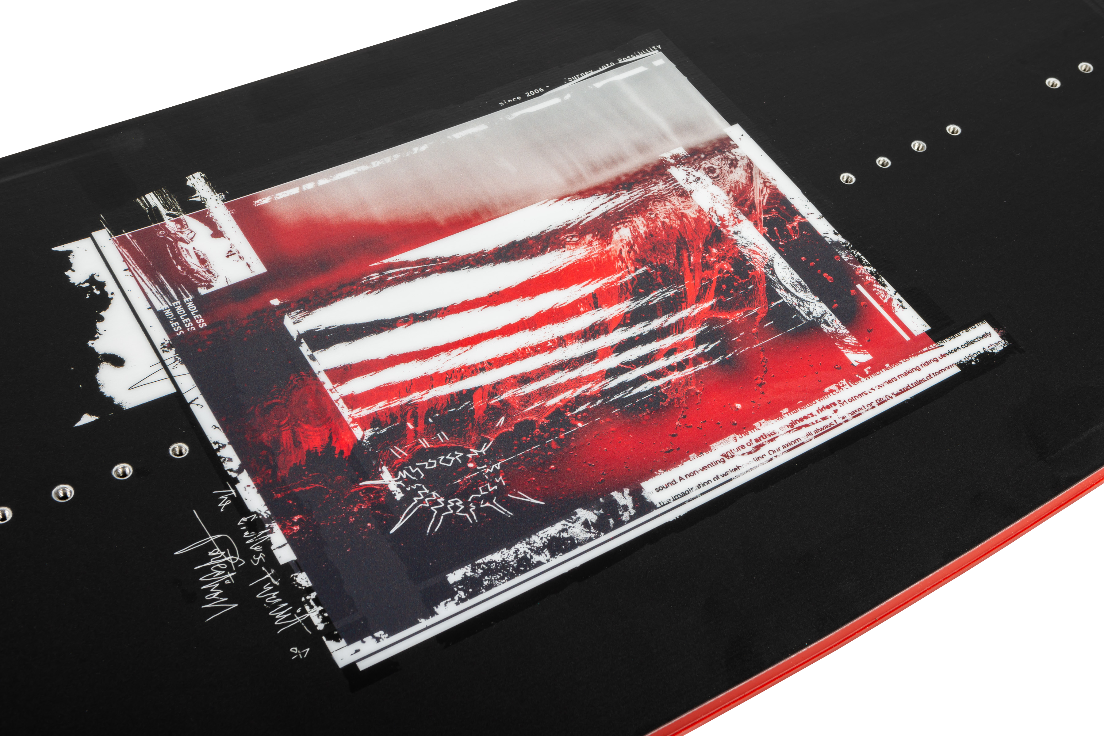 Introducing the Ronix 2025 Kinetic Project Wakeboard: a sleek board designed by Ronix, showcasing abstract art in red, black, and white with layered patterns and text. Its carefully crafted deep channels ensure a smoother ride on the water.