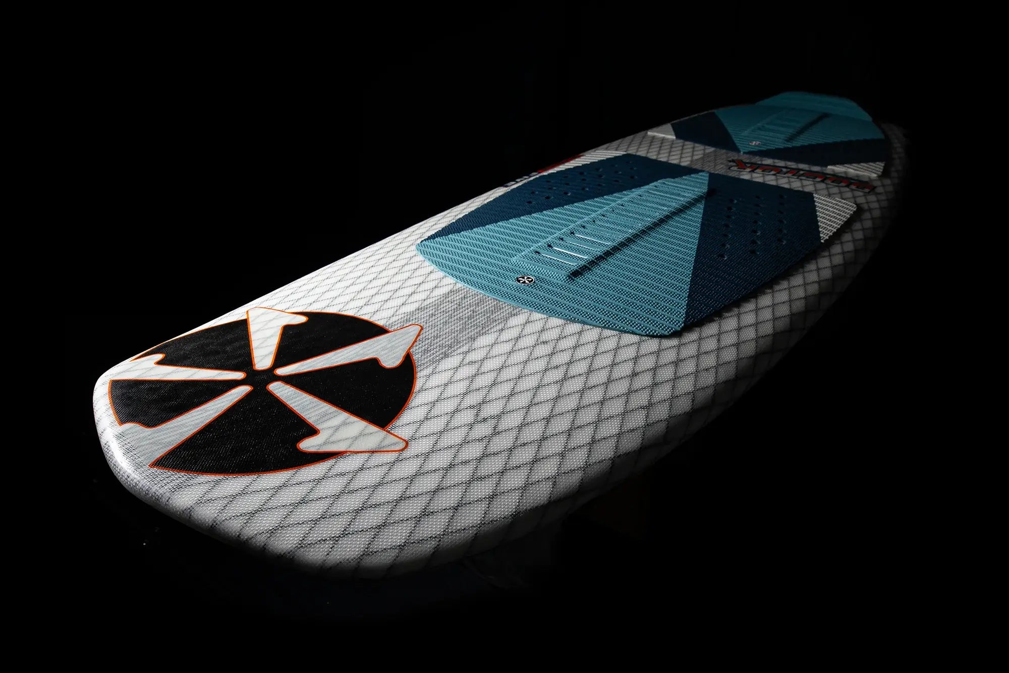An experienced rider showcasing their Phase 5 2024 Doctor Wakesurf Board, demonstrating exceptional stability and board control against a dramatic black background.