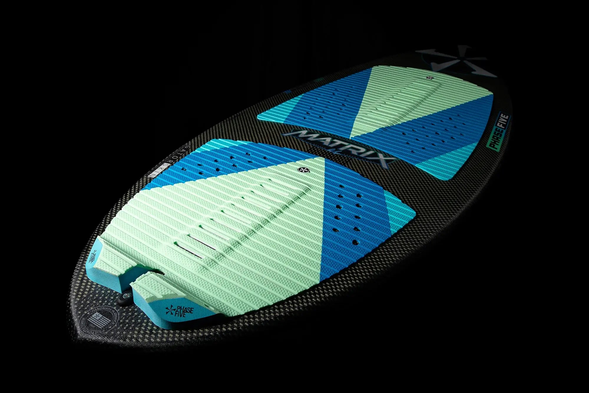 A Phase 5 2024 Matrix Payne Pro Wakesurf Board in blue and green.