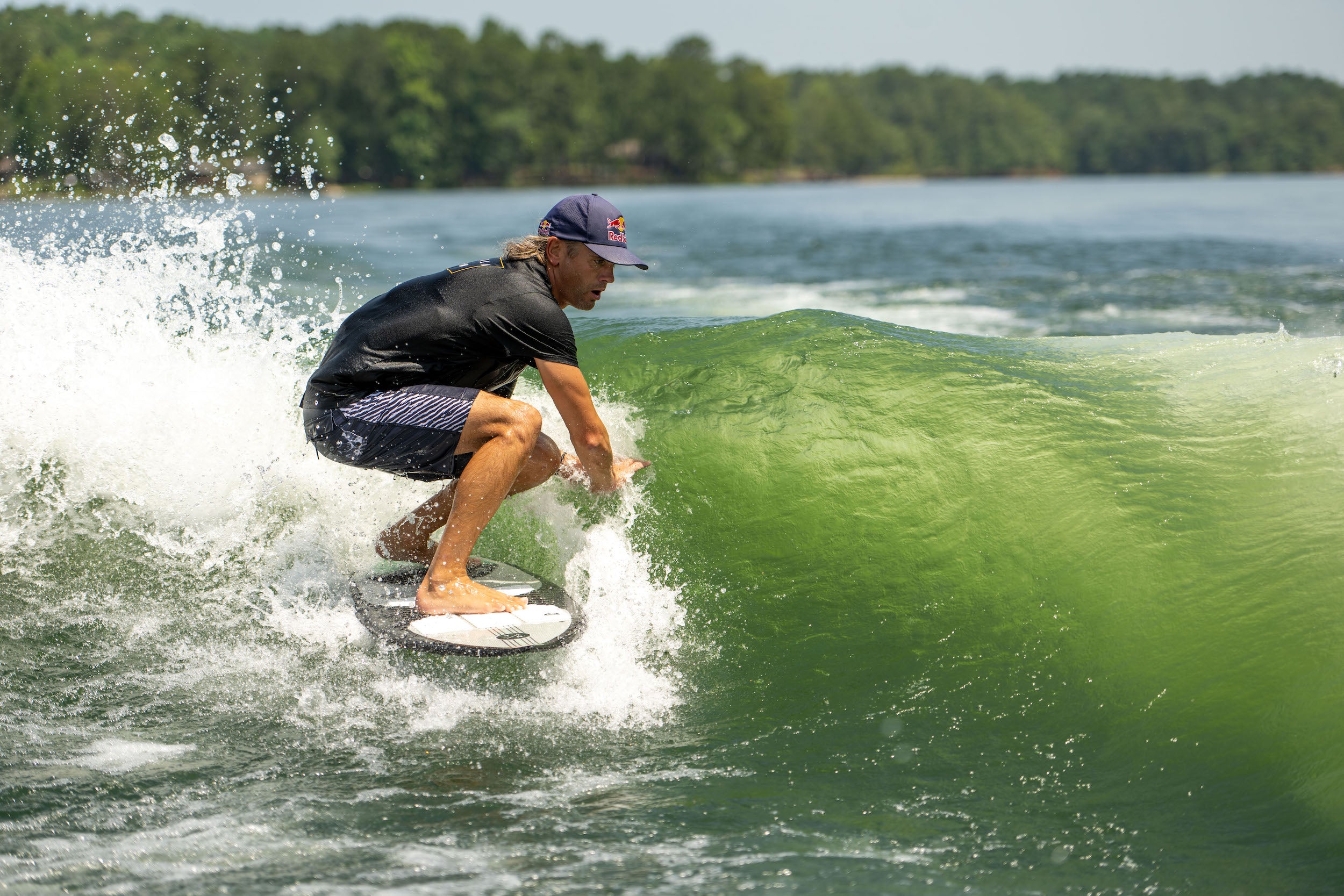 A Hyperlite 2023 Automatic Wakesurf Board riding a wave in Florida.