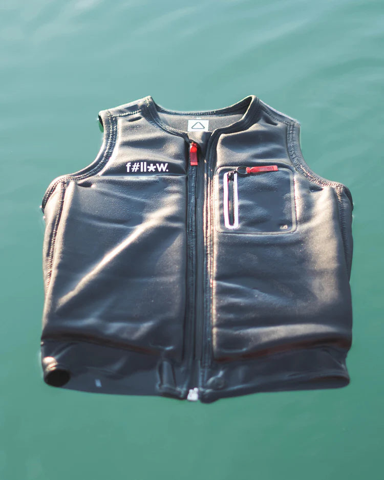 A Follow Wake 2022 F#*FED Men's Jacket - Black vest floating peacefully in the water.
