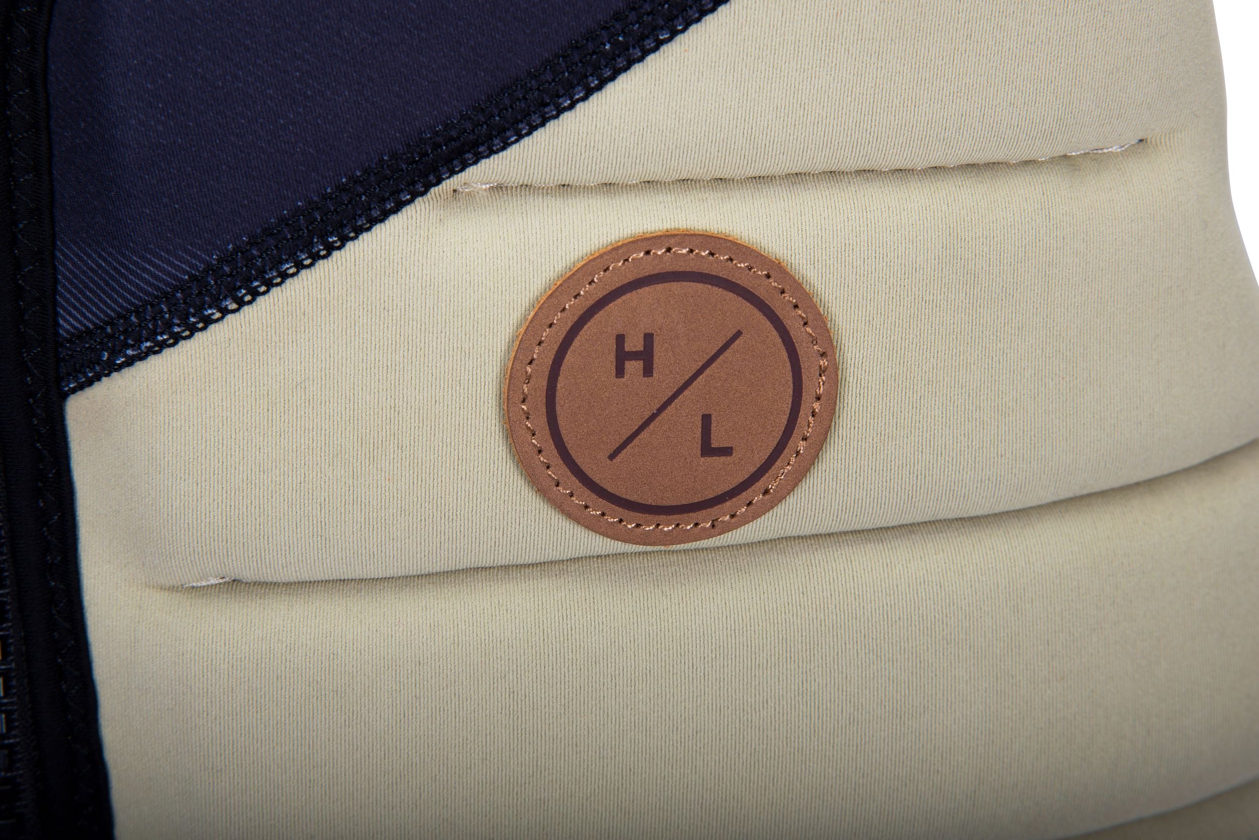 A close up of a Hyperlite vest with a logo on it featuring the Graeme Burress Signature Jacket.