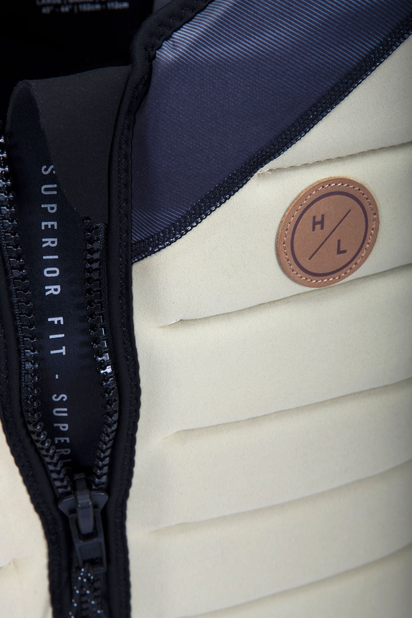 A close up of the Hyperlite 2024 NCGA Wishbone Vest with a zipper.