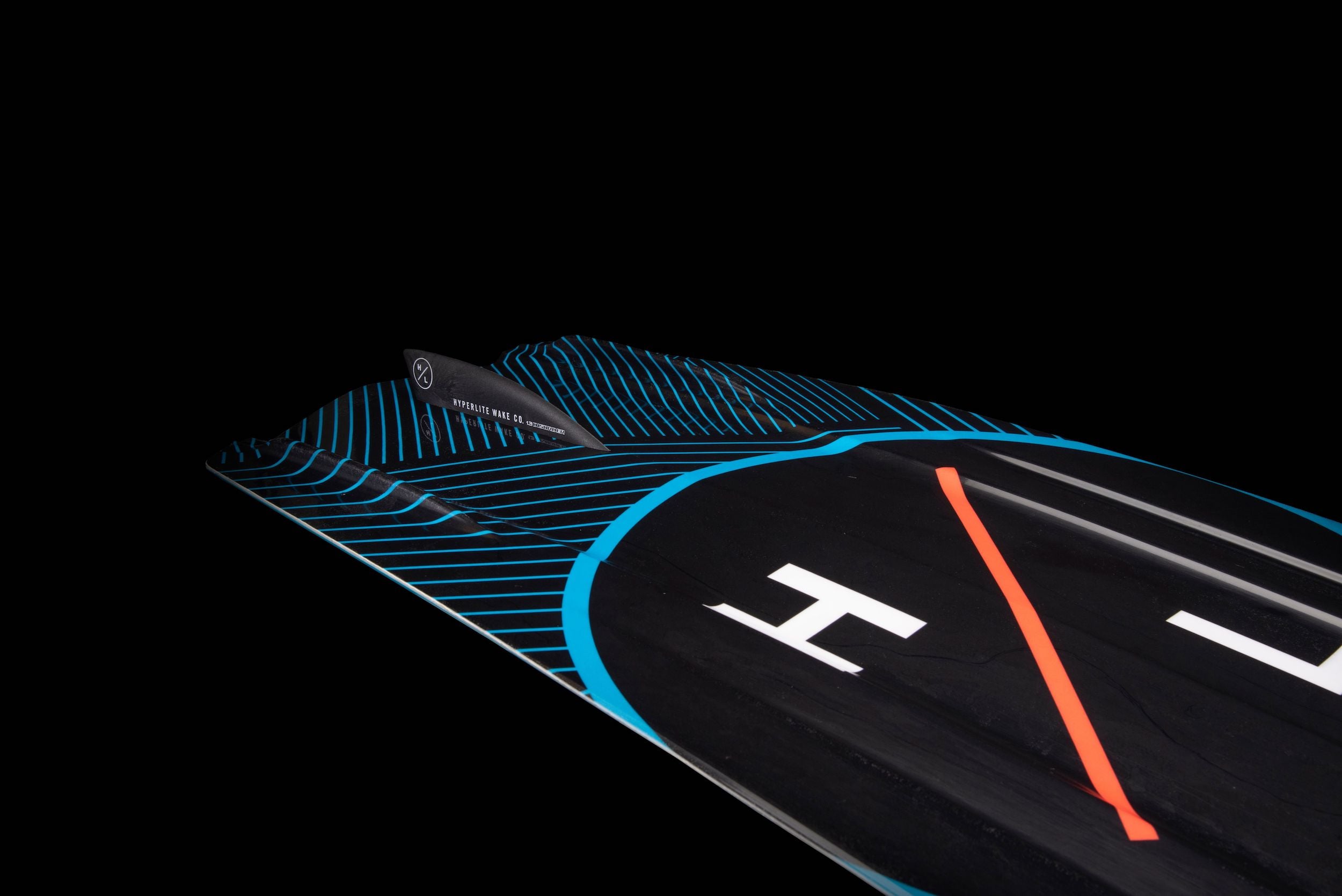 A Hyperlite 2023 State 2.0 Wakeboard with an asymmetrical shape and a blue and orange logo on it.