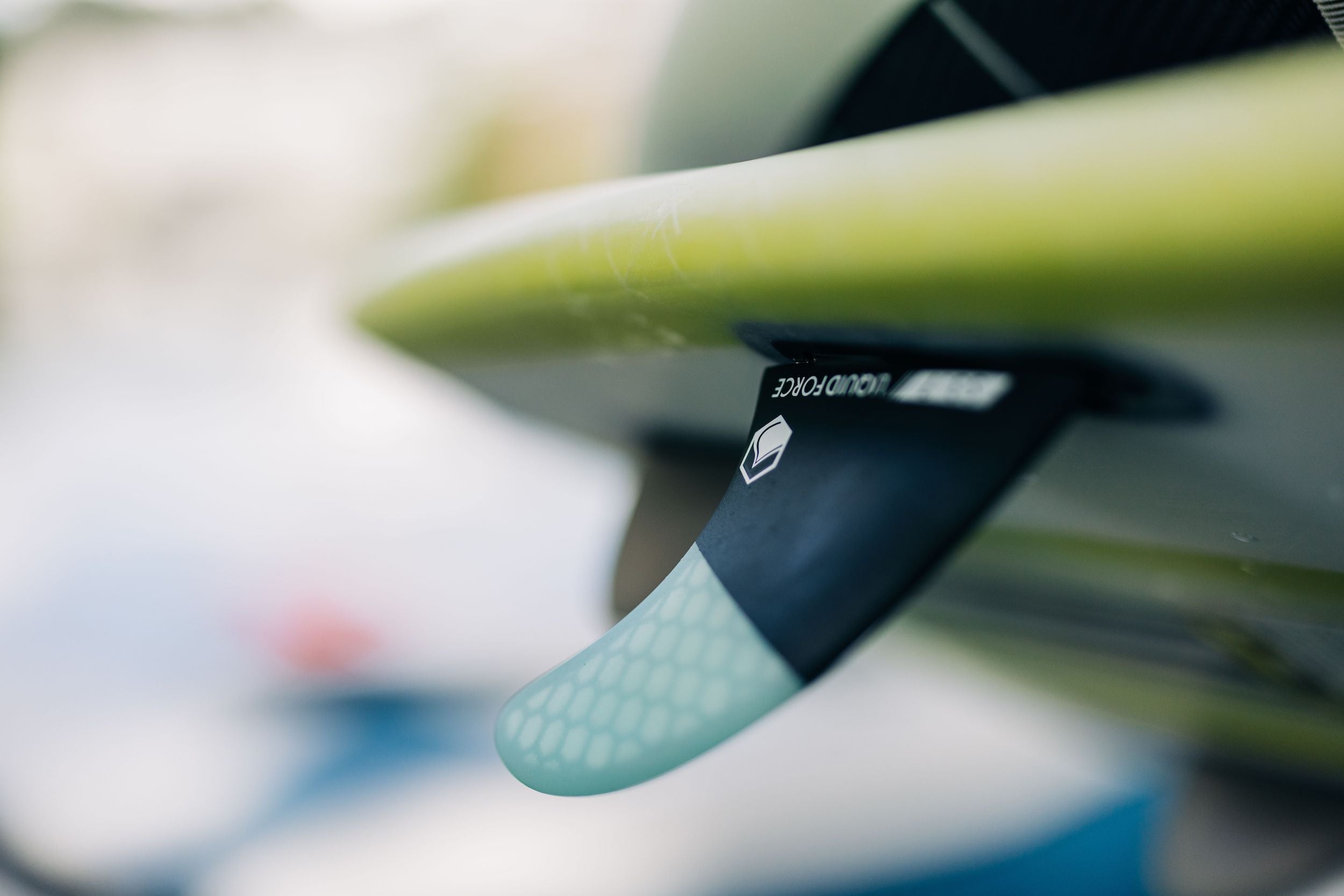 A close up of a Liquid Force 2023 Space Pod Wakesurf Board, showcasing its maneuverability and performance.