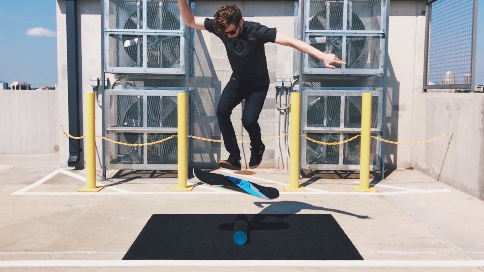 A man showcasing impressive tricks on a Revolution Core 32 Balance Board in a parking lot, demonstrating remarkable balance and skilled progression.