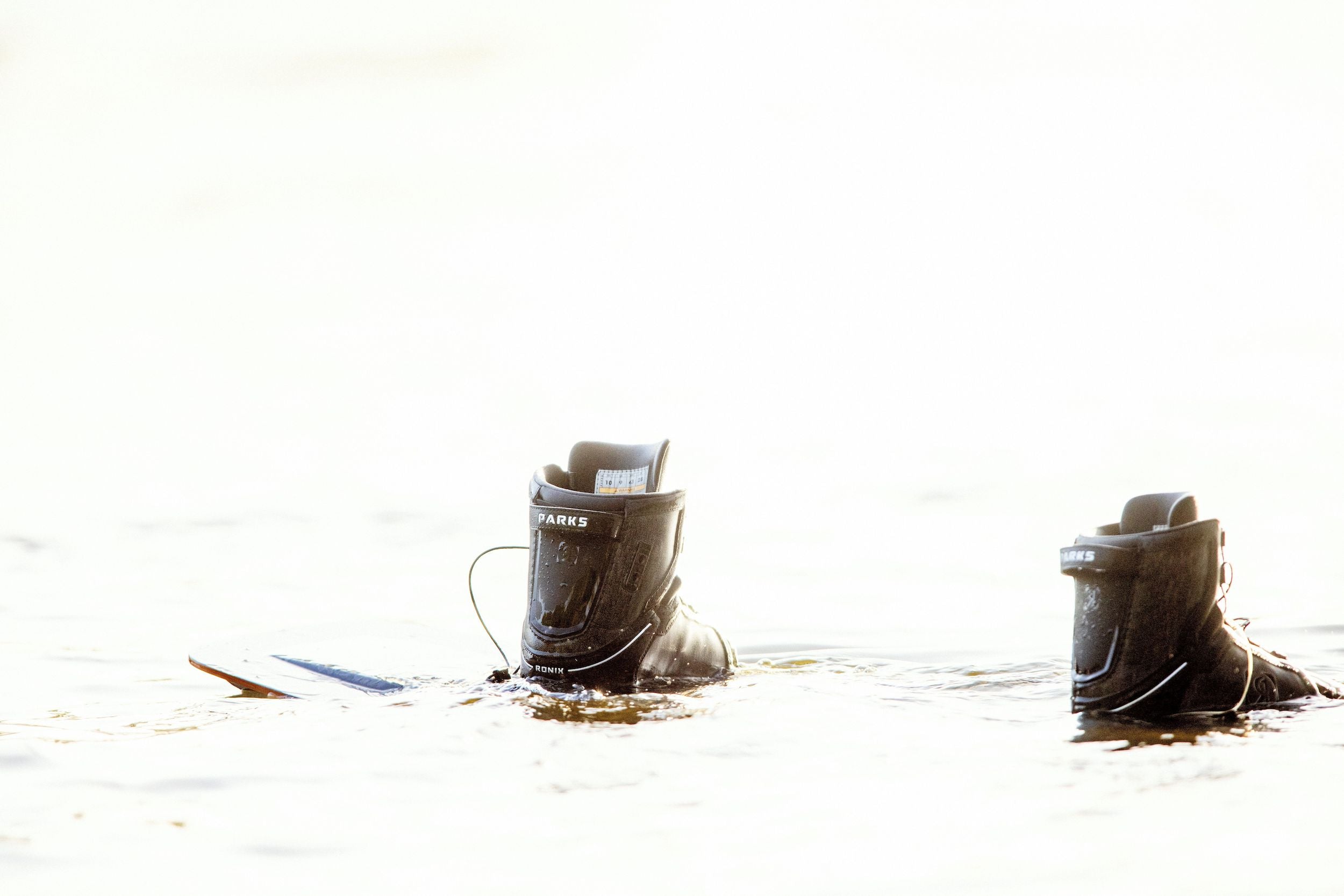 Ronix 2024 Parks Boots with Autolock technology submerged in water.