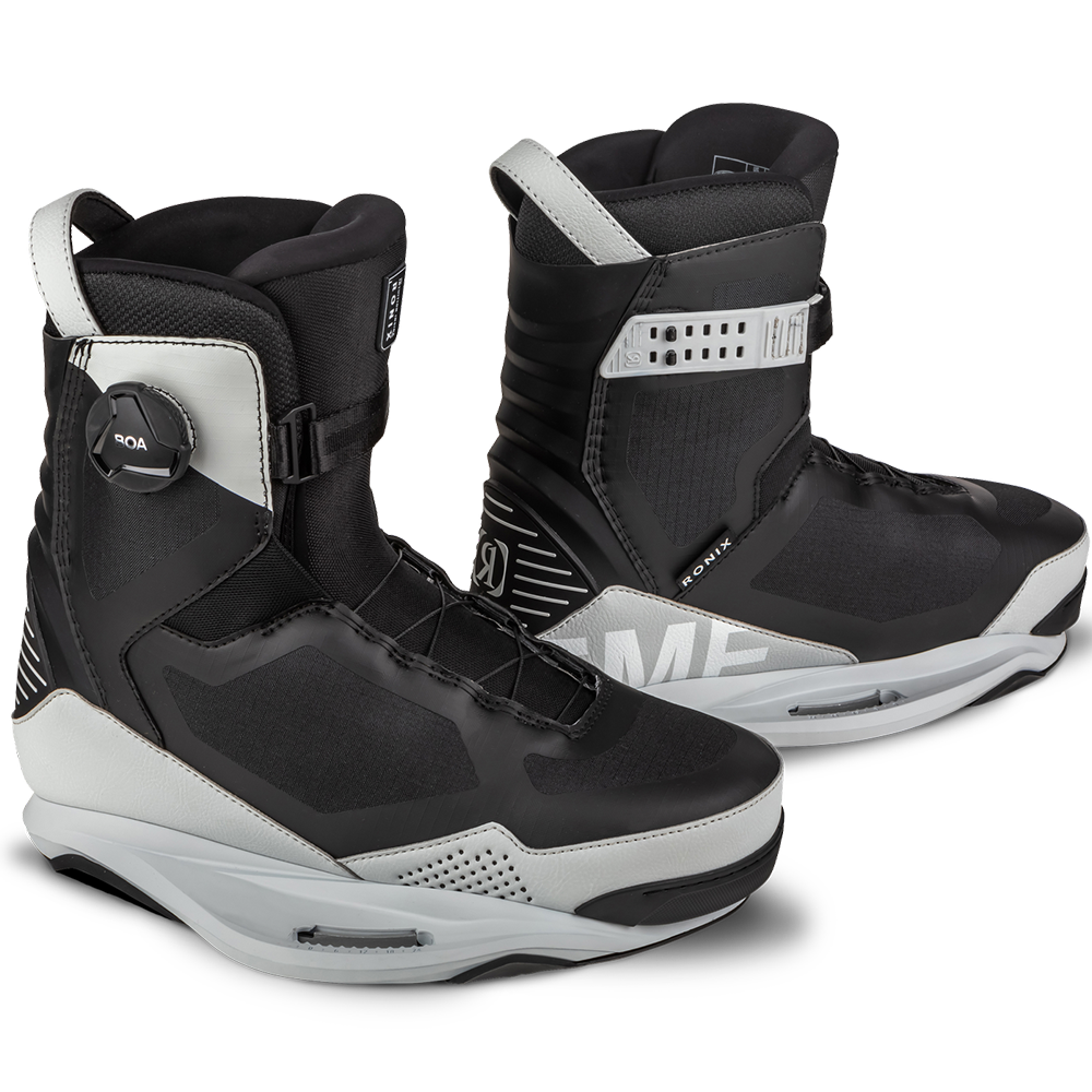 A pair of black and white Ronix 2024 Supreme BOA Bindings featuring the BOA® Fit System and Intuition+ heat moldable liner.