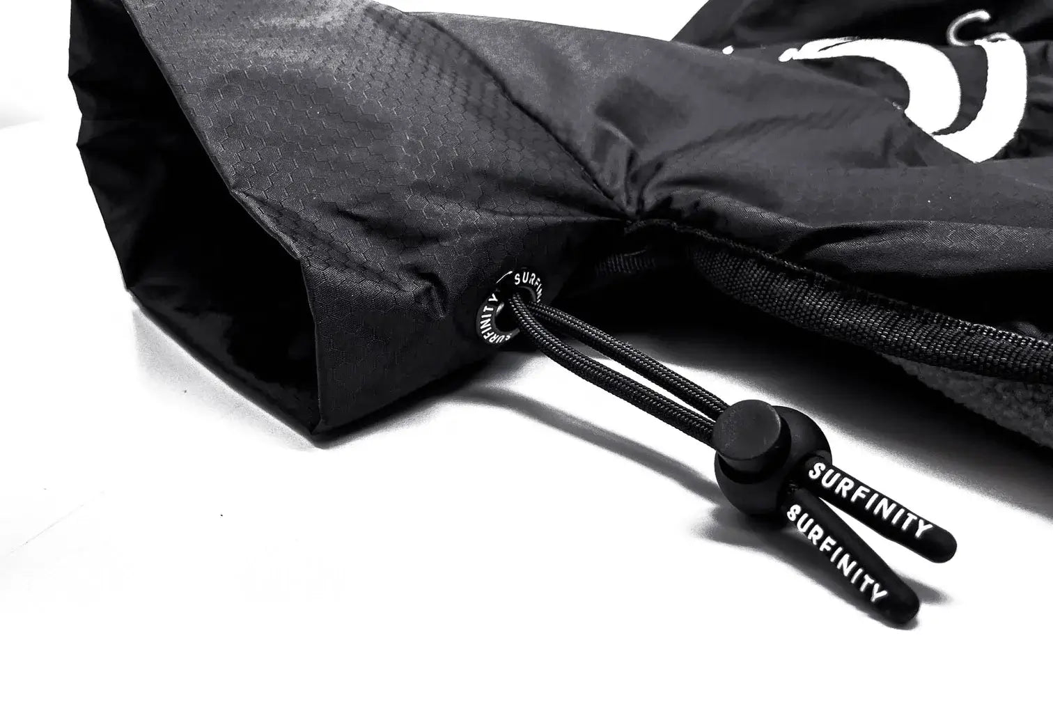 A black Malibu drawstring bag with the Malibu logo on it, suitable for boating hours.